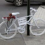 Ghost bike for Sze Man Chan, killed August 11th, 2008 on the corner of Manhattan and Montrose Avenues, Brooklyn.